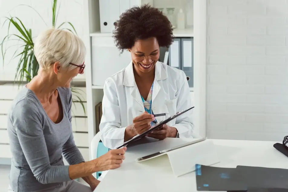 Female doctor and female patient