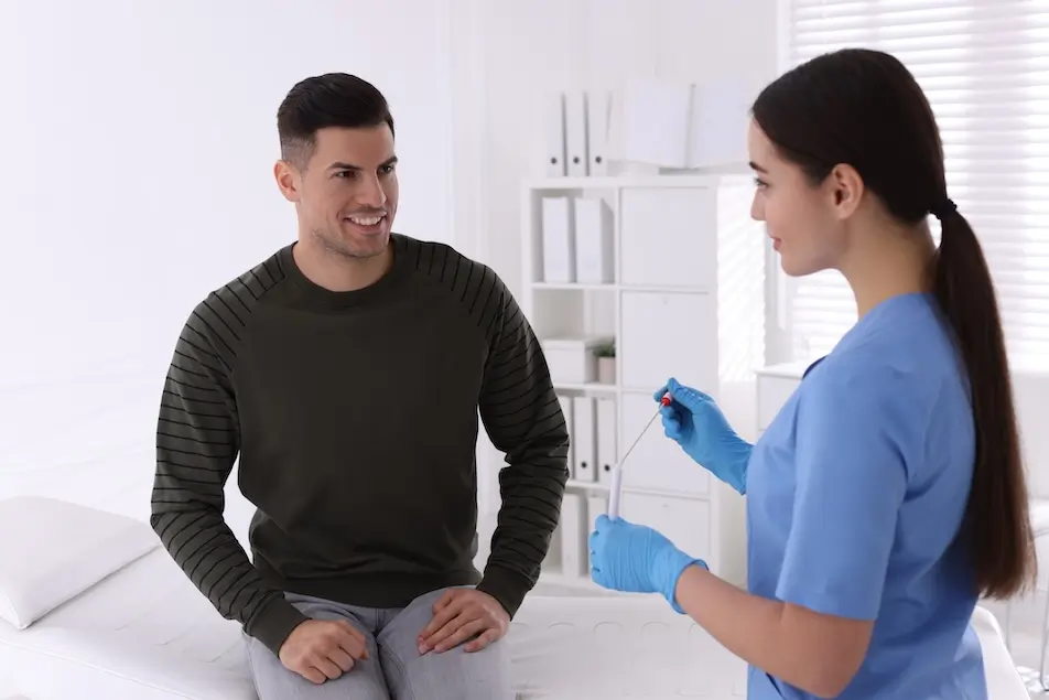 Doctor and patient swab test