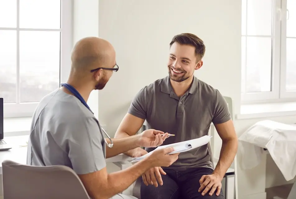 Male doctor and male patient