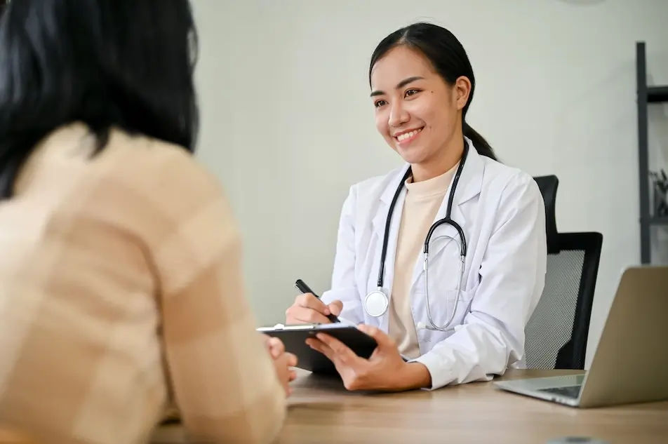 Female doctor and female patient consultation