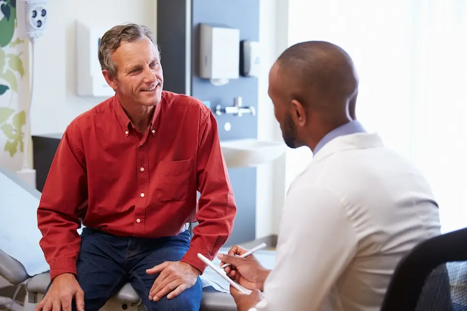 Male doctor and male patient consultation