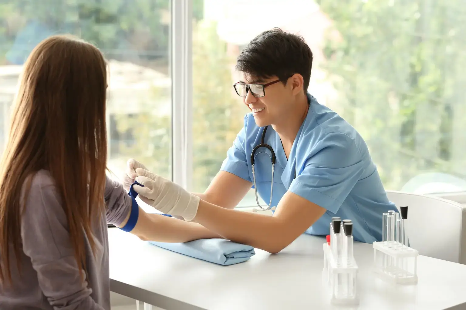 Doctor and patient blood test