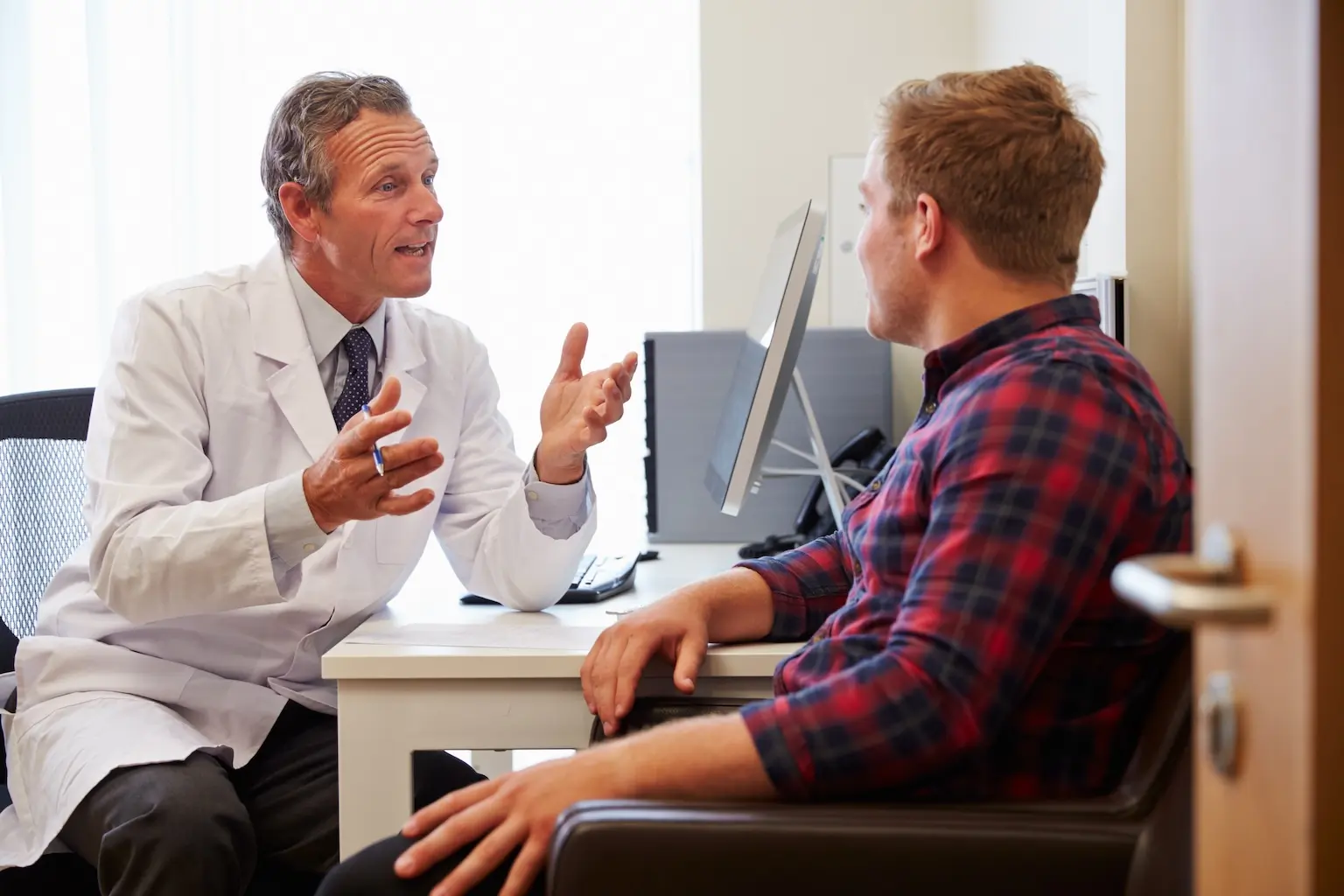 Doctor talking to a patient