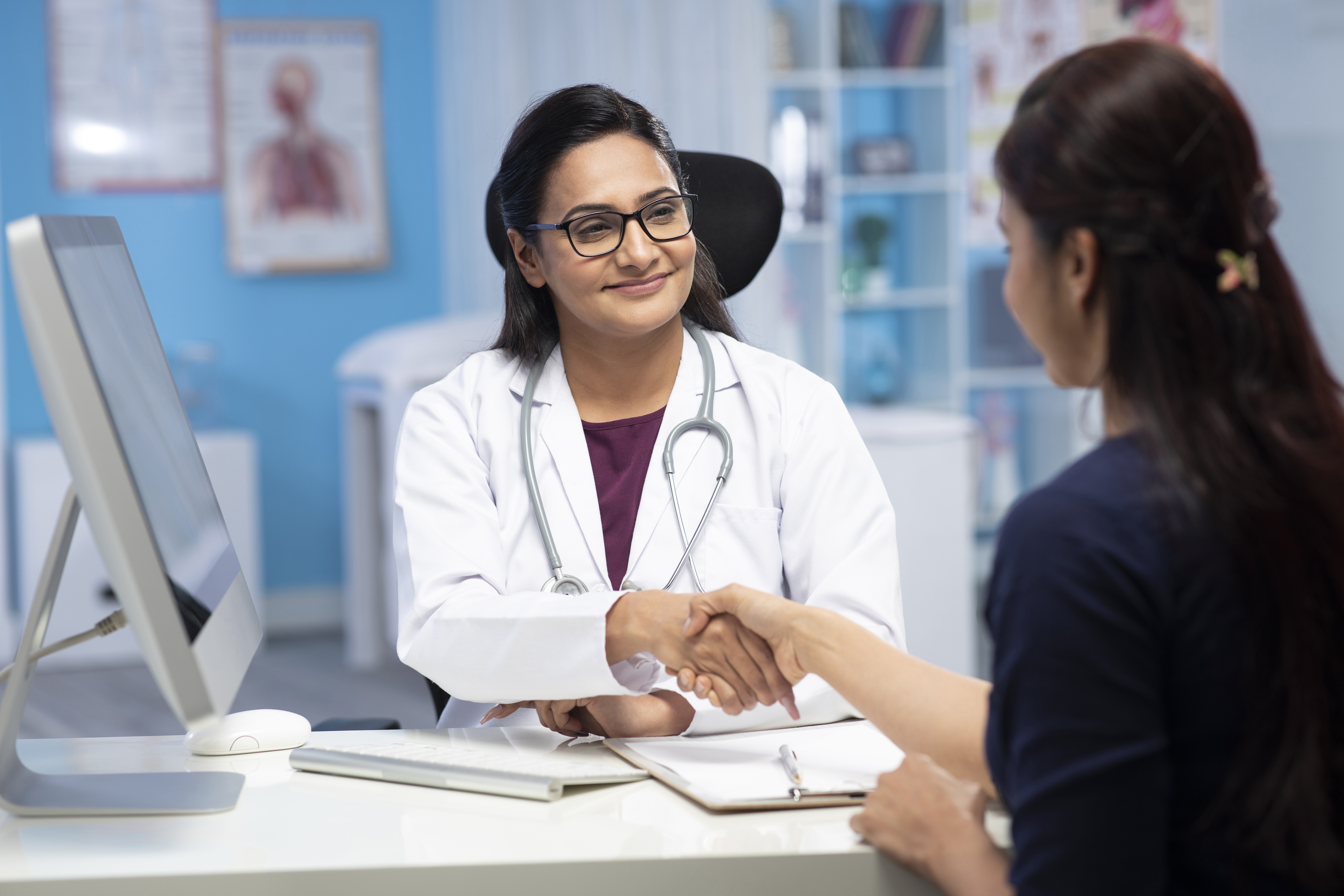 Doctor greeting patient